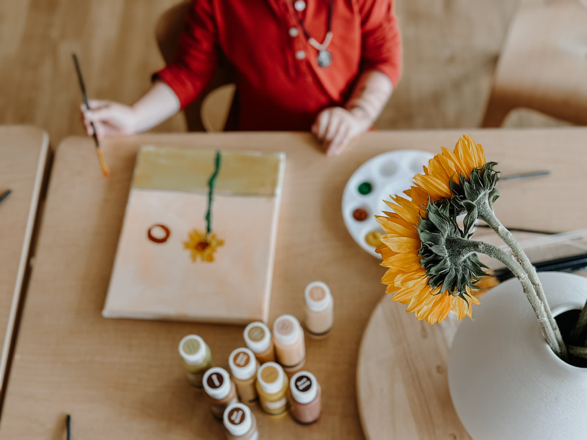 Kat facilitating creative learning — classroom scene